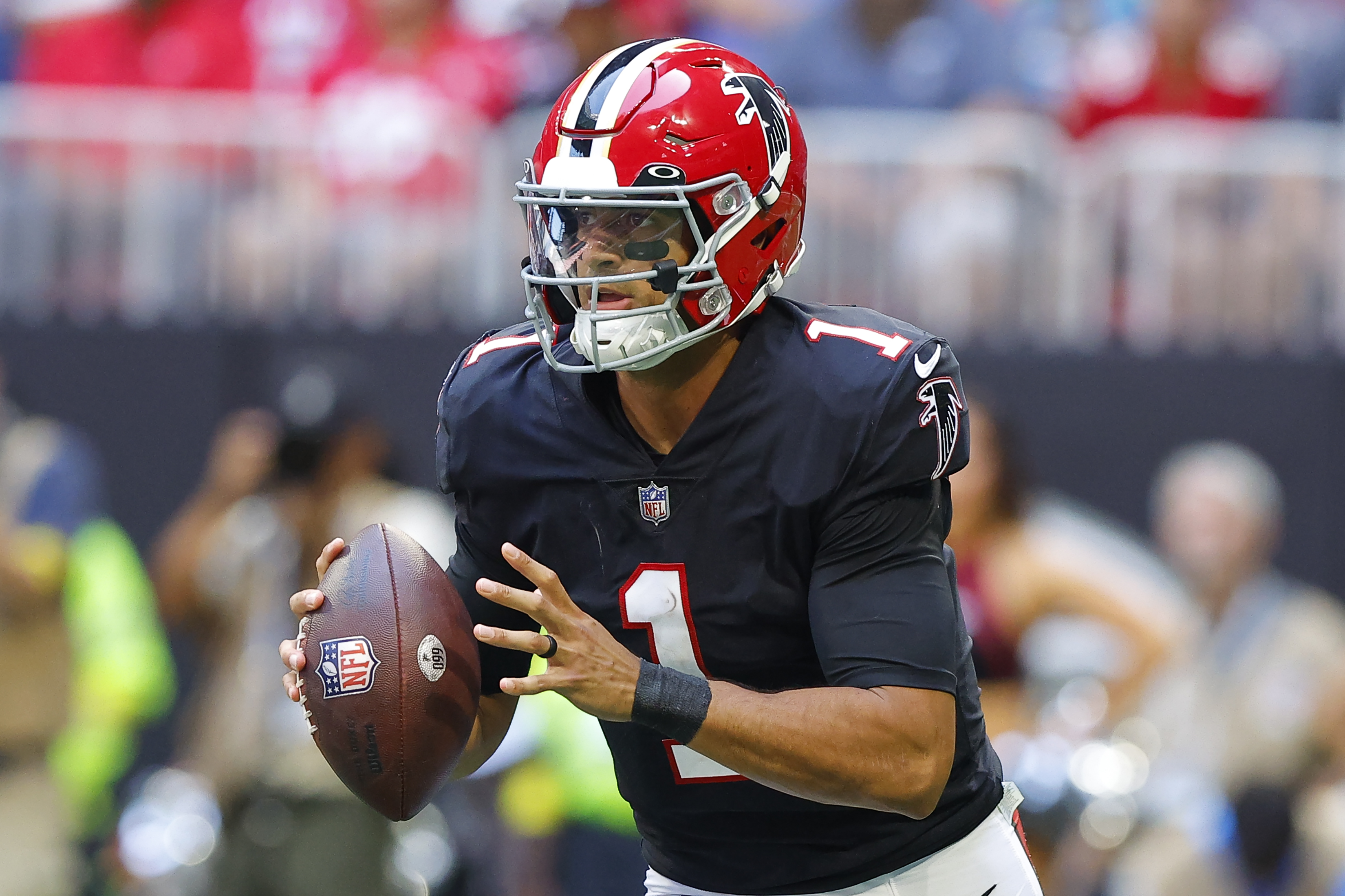 Marcus Mariota #1 of the Atlanta Falcons rolls out to pass during the second half against the San Francisco 49ers at Mercedes-Benz Stadium on October 16, 2022 in Atlanta, Georgia.