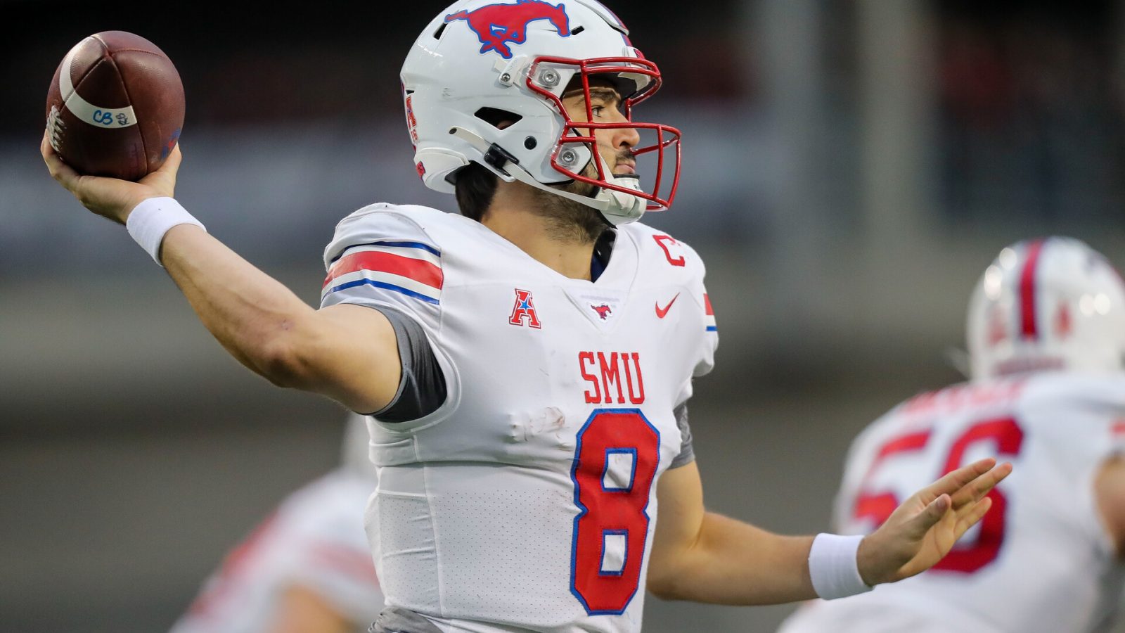 Nov 20, 2021; Cincinnati, Ohio, USA; Southern Methodist Mustangs quarterback Tanner Mordecai (8) throws a pass against the Cincinnati Bearcats in the first half at Nippert Stadium.
