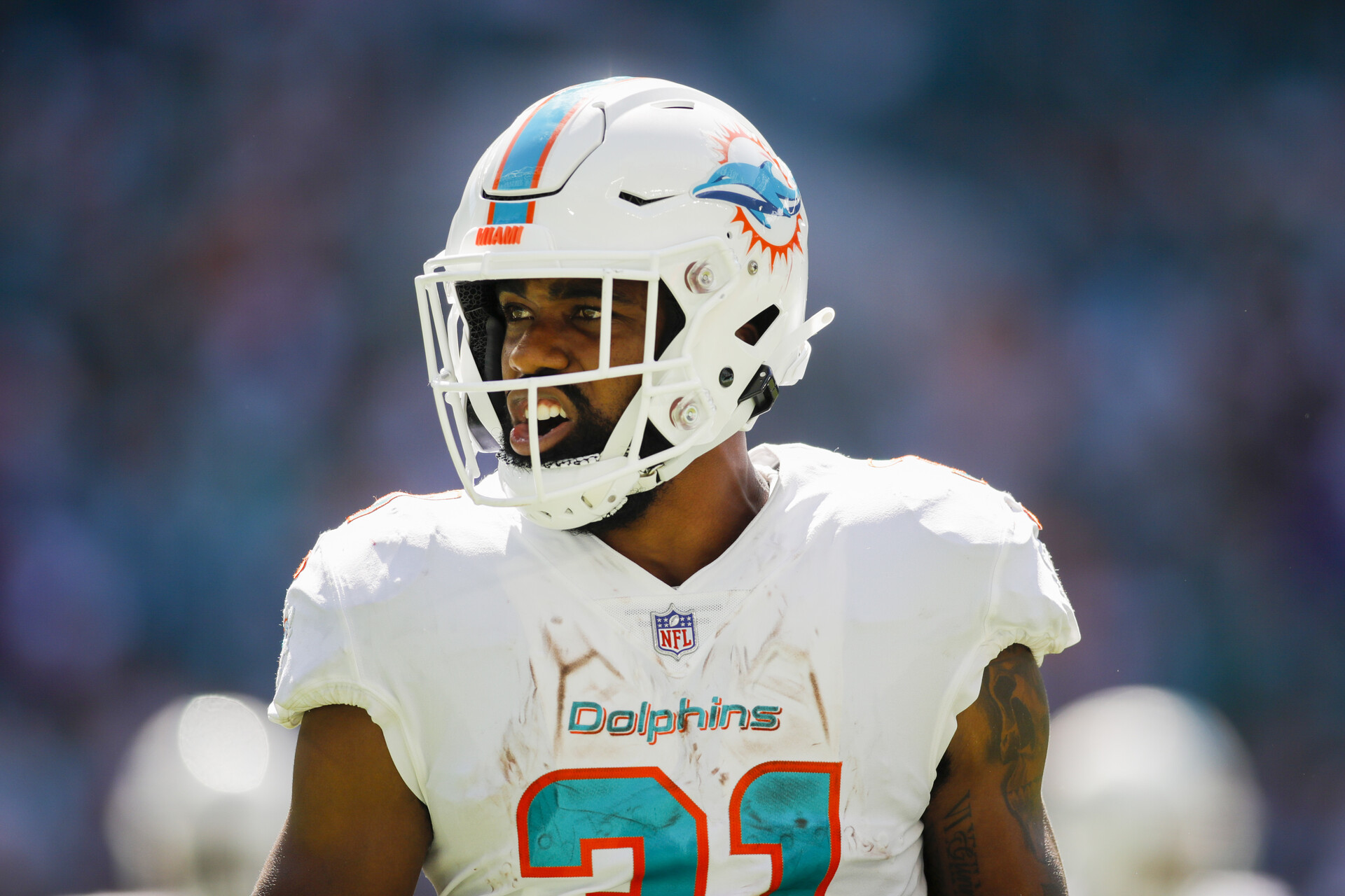 Miami Dolphins running back Raheem Mostert (31) reacts from the field during the fourth quarter against the New England Patriots at Hard Rock Stadium.