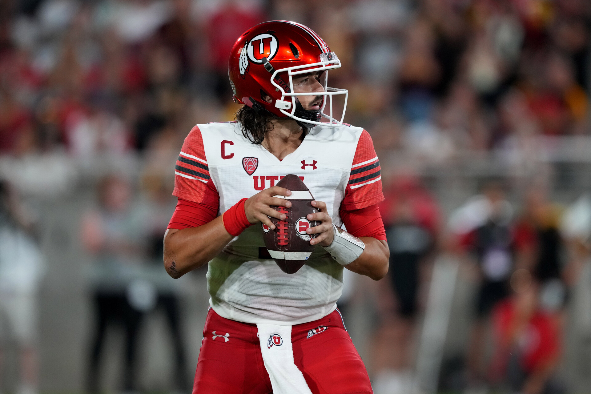 Sep 24, 2022; Tempe, Arizona, USA; Utah Utes quarterback Cameron Rising (7) drops back to pass against the Arizona State Sun Devils during the first half at Sun Devil Stadium.