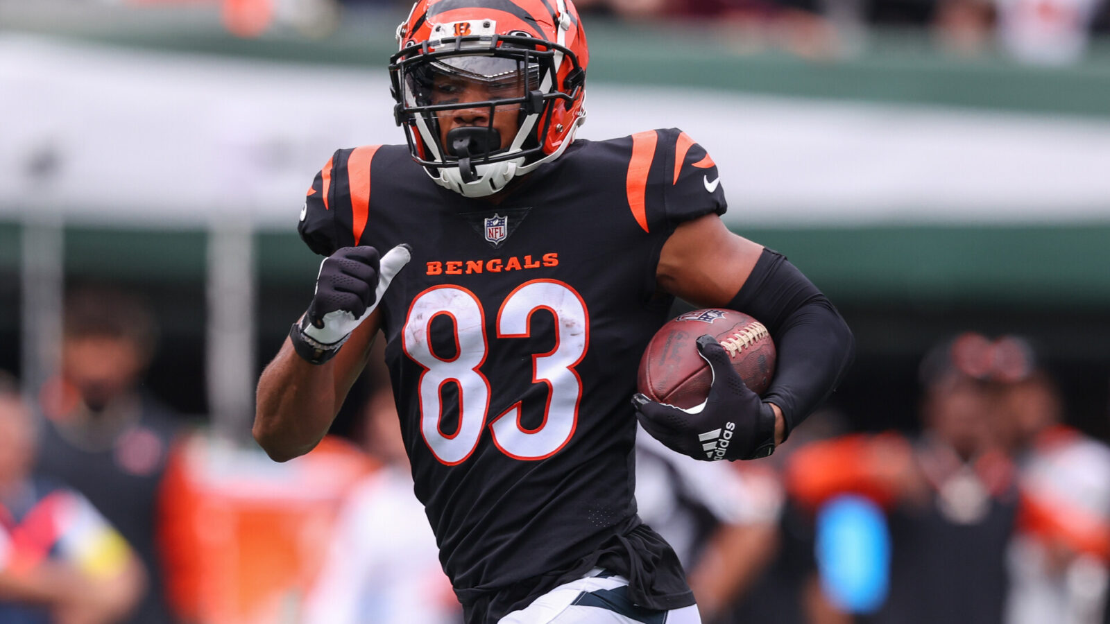 Sep 25, 2022; East Rutherford, New Jersey, USA; Cincinnati Bengals wide receiver Tyler Boyd (83) runs for a touchdown against the New York Jets during the first half at MetLife Stadium.