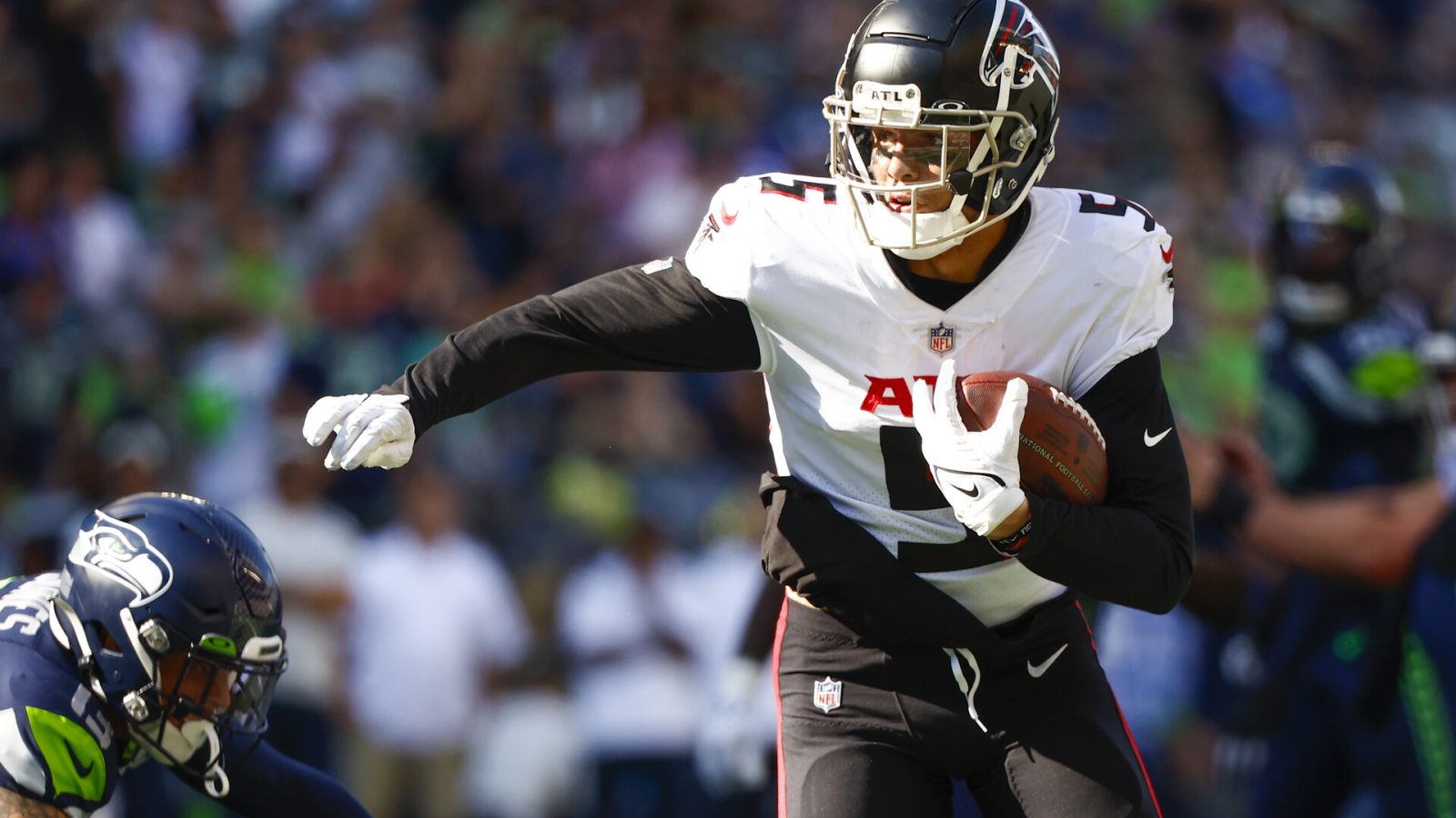 Sep 25, 2022; Seattle, Washington, USA; Atlanta Falcons wide receiver Drake London (5) runs a reception into the end zone for a touchdown against the Seattle Seahawks during the third quarter at Lumen Field.