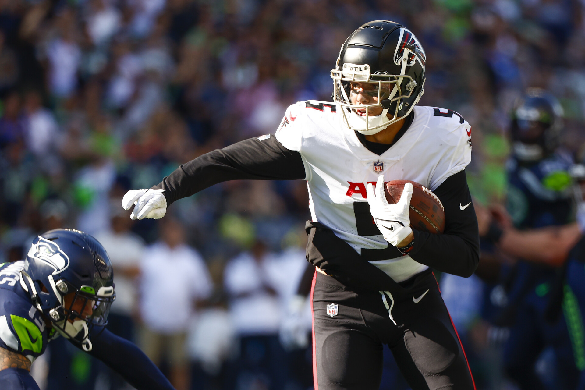 Sep 25, 2022; Seattle, Washington, USA; Atlanta Falcons wide receiver Drake London (5) runs a reception into the end zone for a touchdown against the Seattle Seahawks during the third quarter at Lumen Field.
