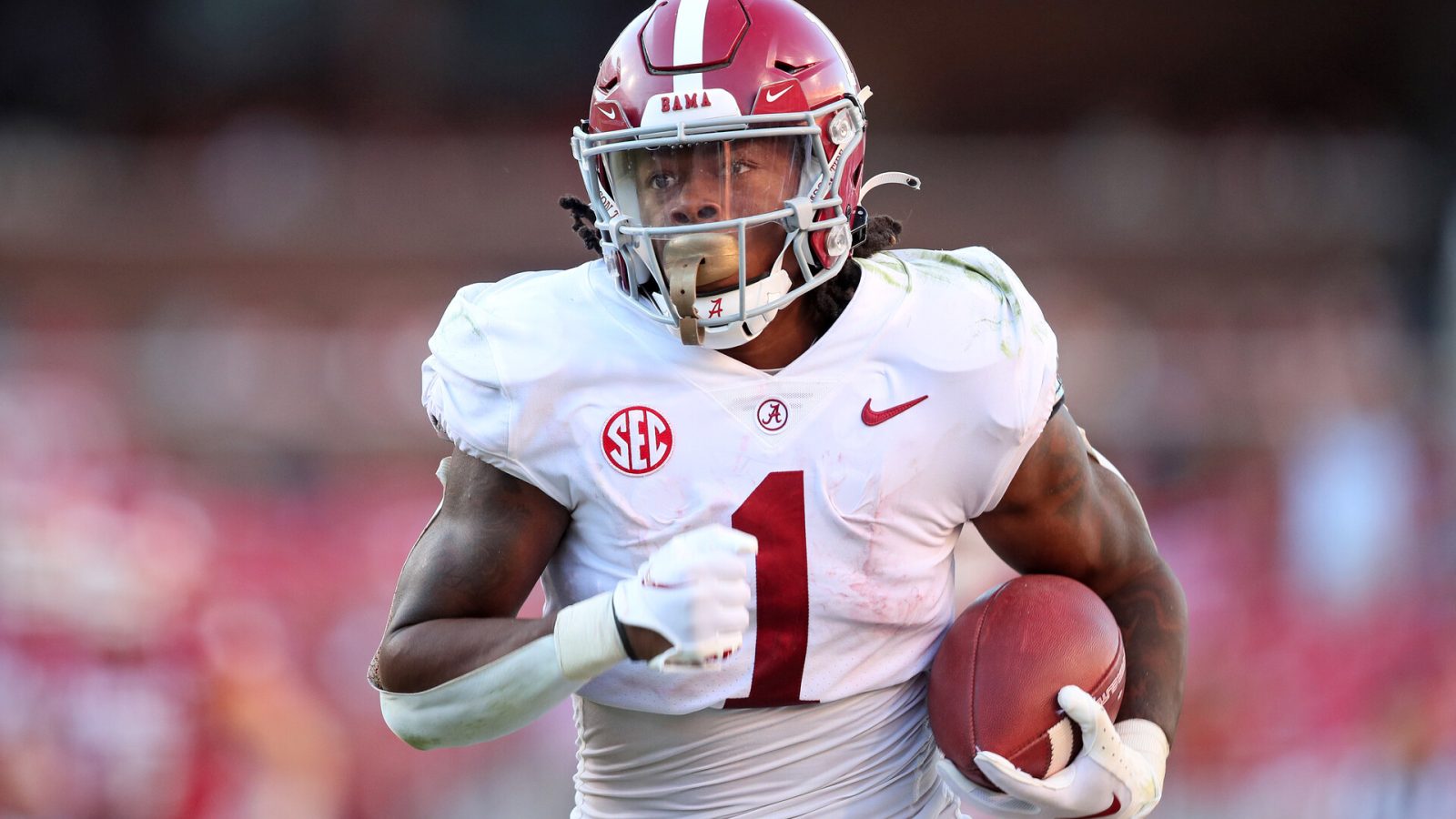 Oct 1, 2022; Fayetteville, Arkansas, USA; Alabama Crimson Tide running back Jahmyr Gibbs (1) rushes for a touchdown in the fourth quarter against the Arkansas Razorbacks at Donald W. Reynolds Razorback Stadium. Alabama won 49-26.