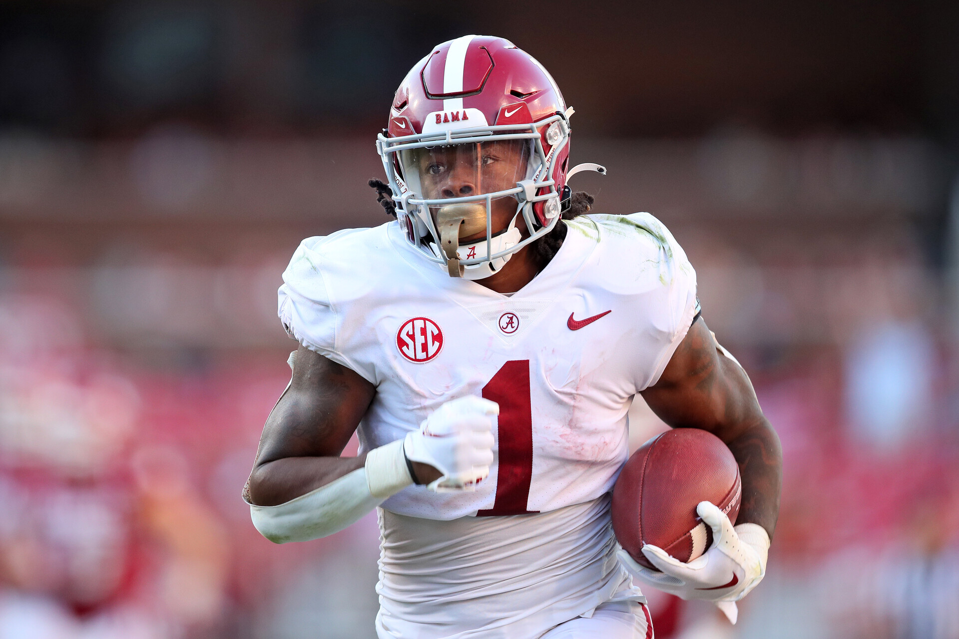 Oct 1, 2022; Fayetteville, Arkansas, USA; Alabama Crimson Tide running back Jahmyr Gibbs (1) rushes for a touchdown in the fourth quarter against the Arkansas Razorbacks at Donald W. Reynolds Razorback Stadium. Alabama won 49-26.
