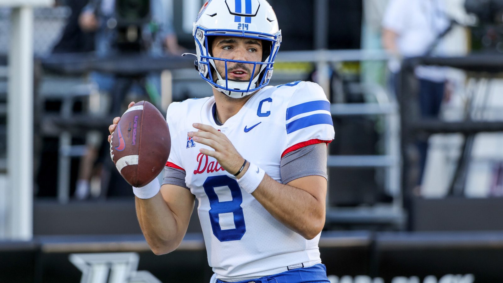 1Oct 5, 2022; Orlando, Florida, USA; Southern Methodist Mustangs quarterback Tanner Mordecai (8) warms up before a game against the UCF Knights at FBC Mortgage Stadium.