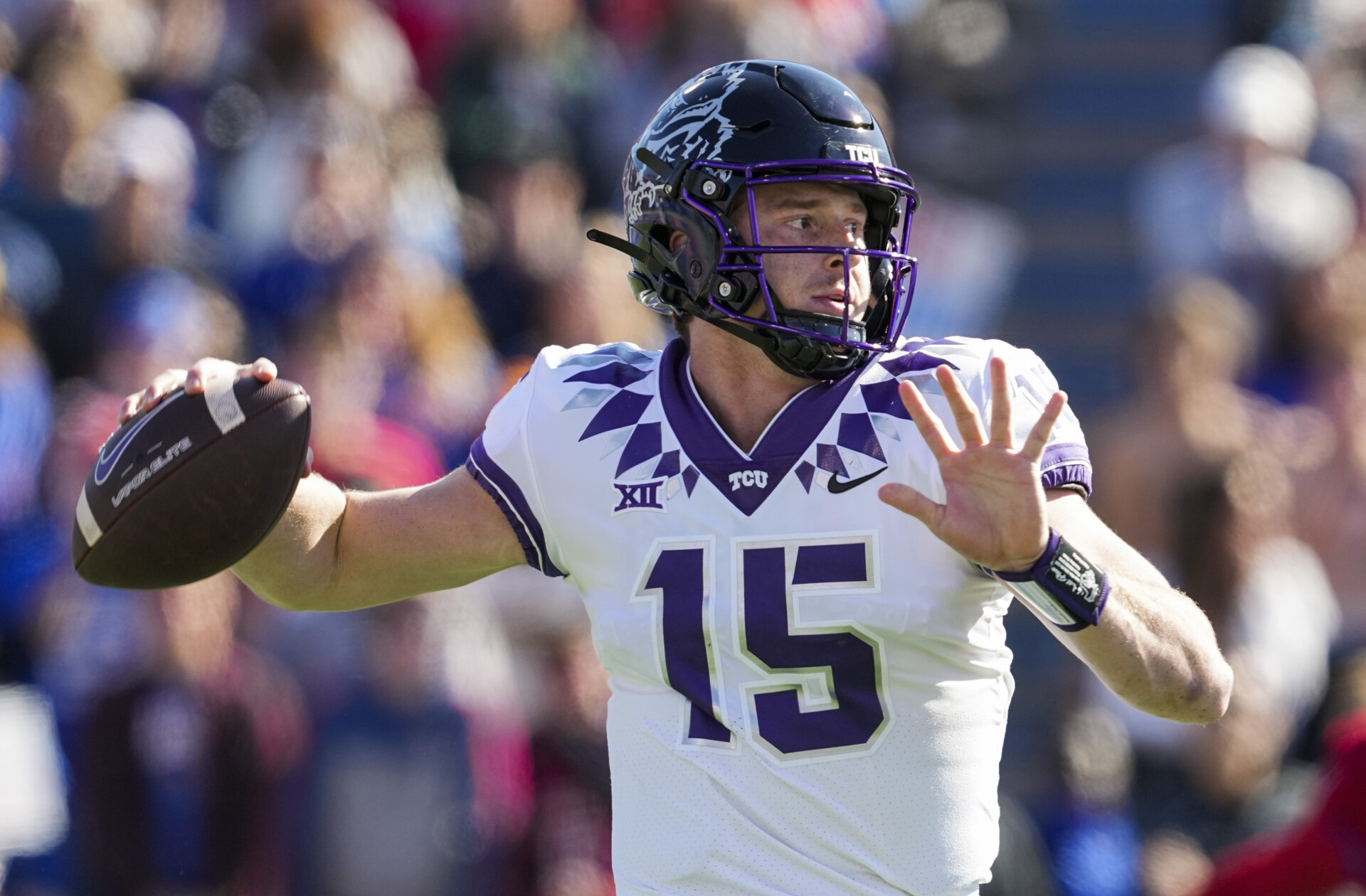 TCU Horned Frogs quarterback Max Duggan (15) throws a pass during the first half against the Kansas Jayhawks at David Booth Kansas Memorial Stadium.