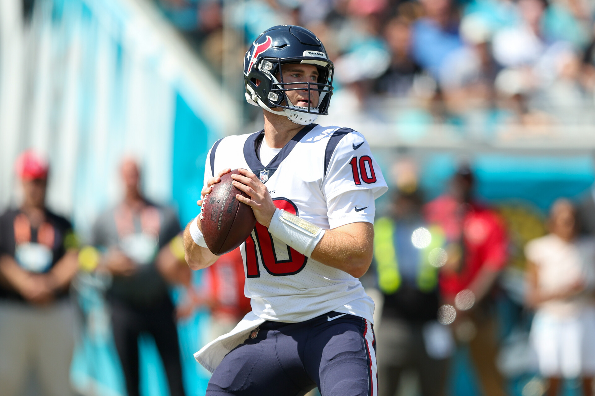 Oct 9, 2022; Jacksonville, Florida, USA; Houston Texans quarterback Davis Mills (10) drops back to pass against the Jacksonville Jaguars in the first quarter at TIAA Bank Field.