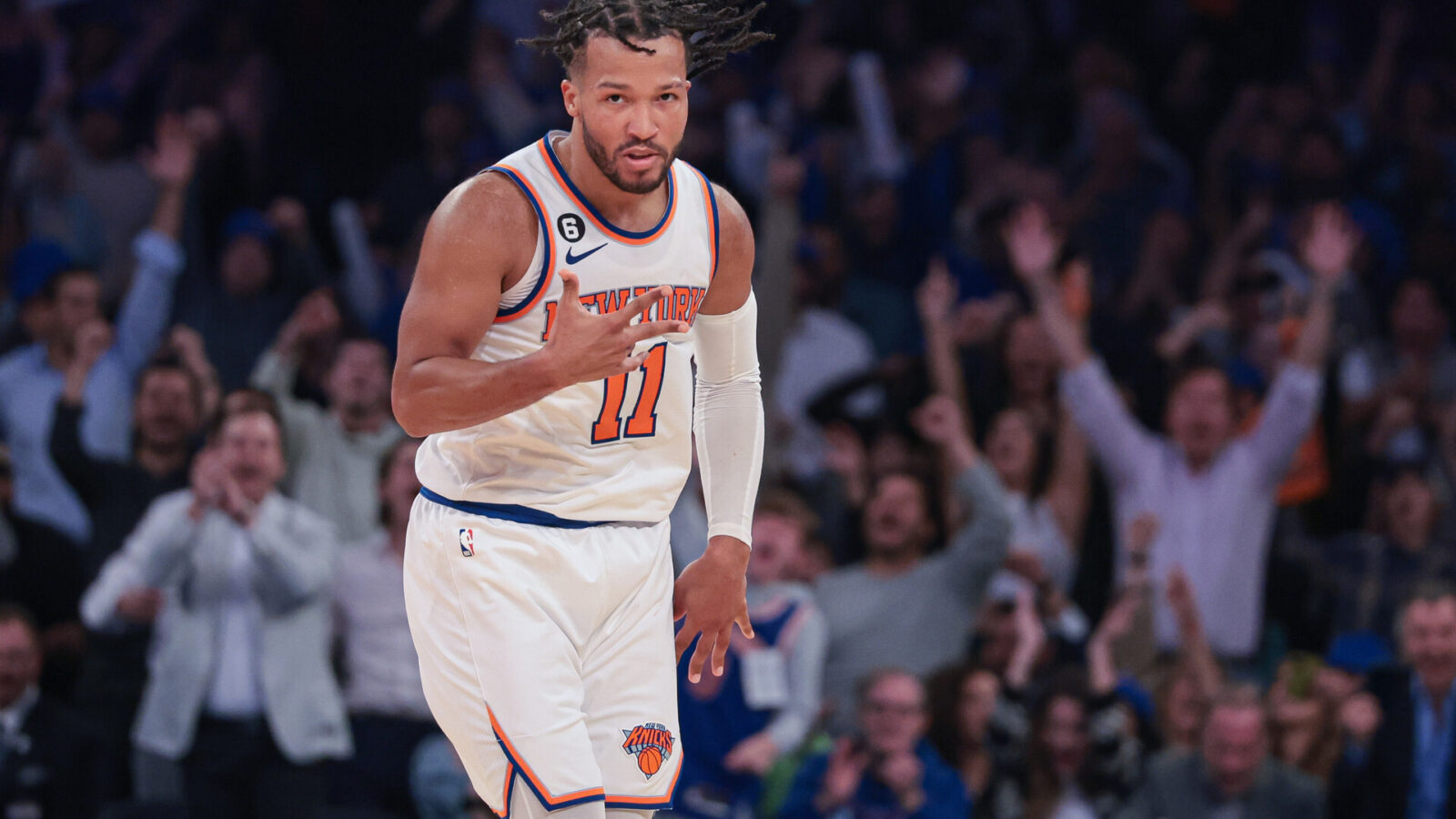 New York Knicks guard Jalen Brunson (11) reacts after making a three point basket during the fourth quarter against the Charlotte Hornets at Madison Square Garden.