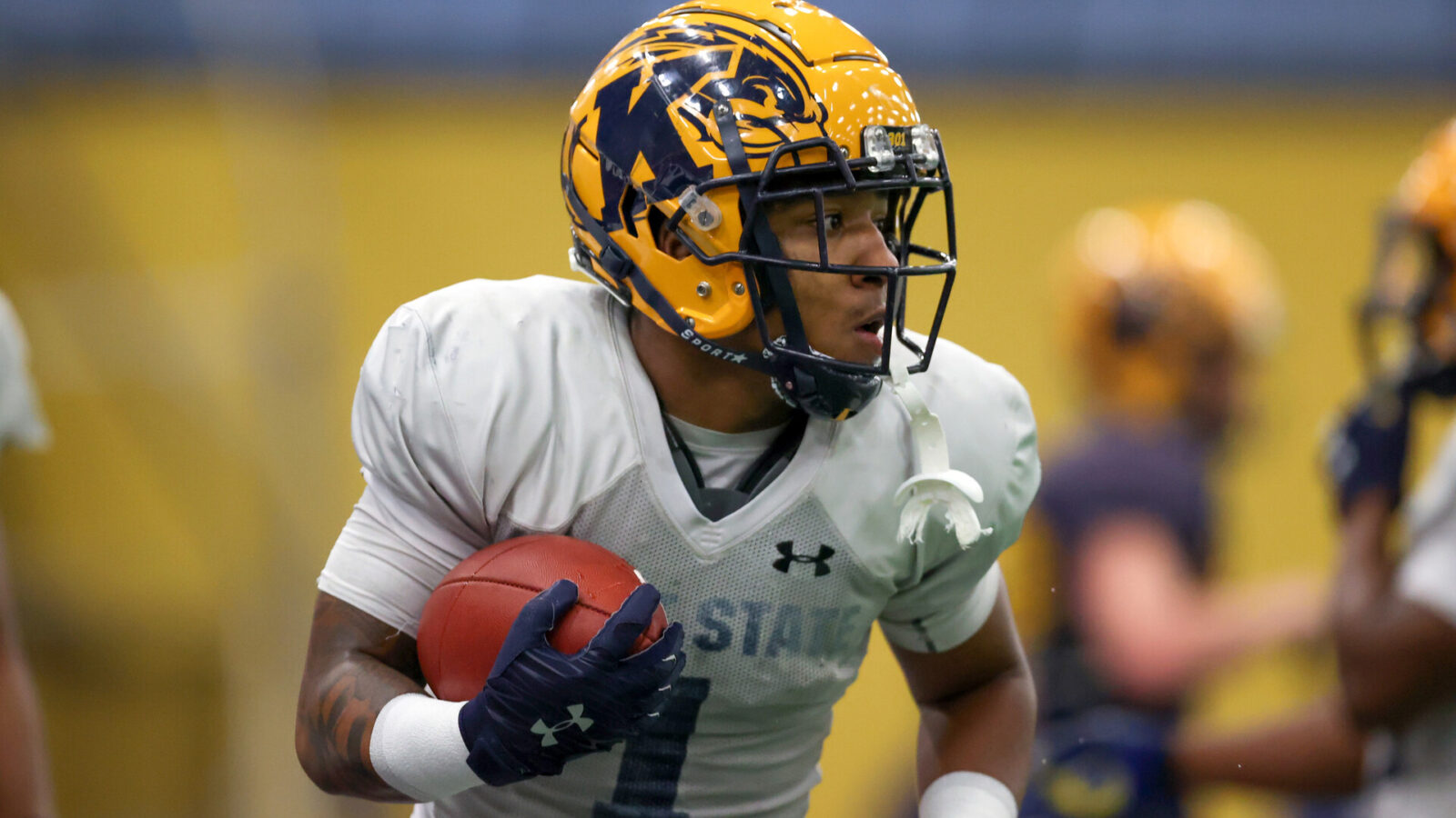 KENT, OH - APRIL 16: Kent State Golden Flashes running back Marquez Cooper (1) participates in drills during the Kent State Golden Flashes spring football game on April 16, 2022, at Dix Stadium in Kent, OH.