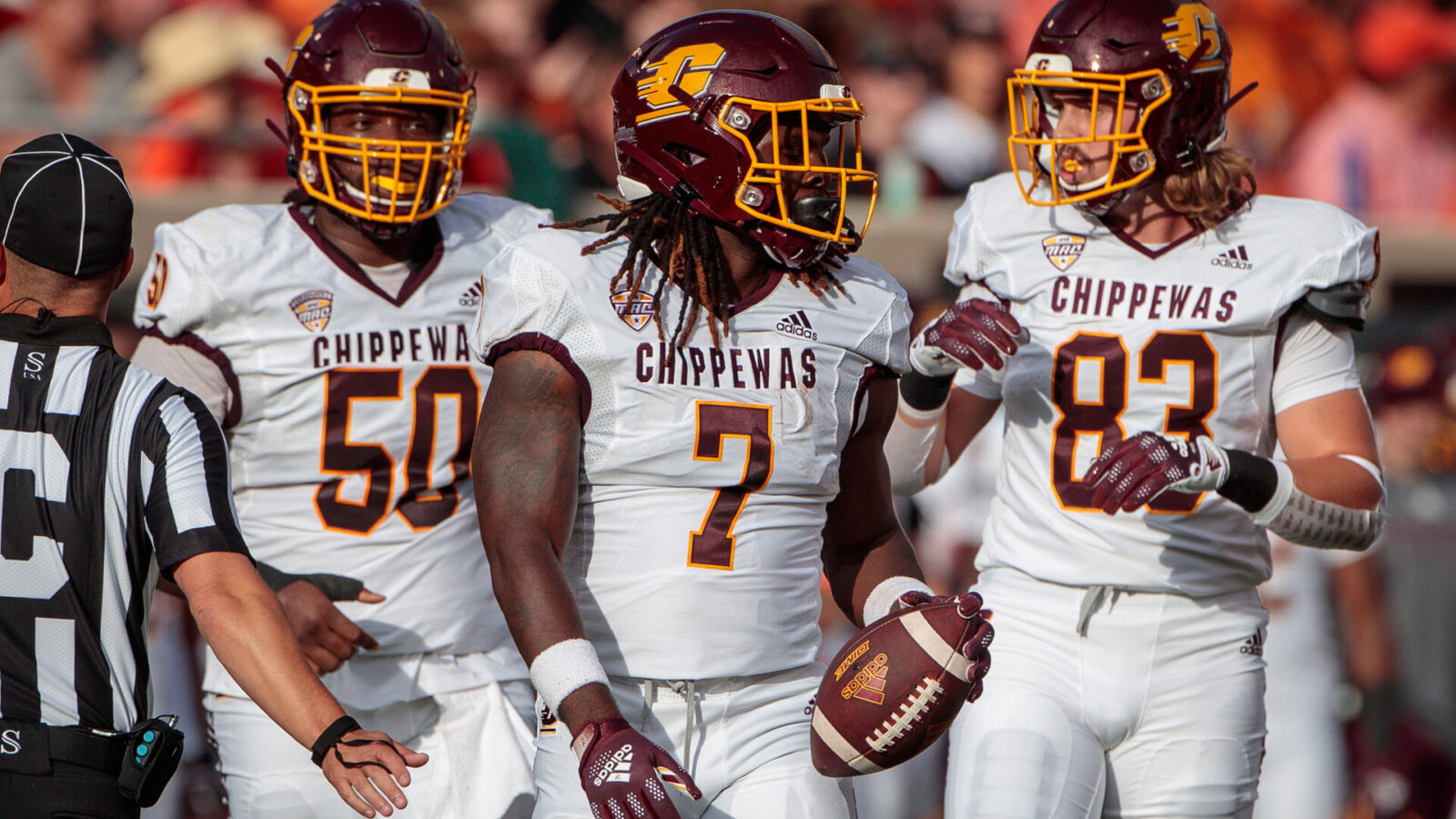 Central Michigan Chippewas running back Lew Nichols III (7) walks to the huddle during the game against the Central Michigan Chippewas on September 1st, 2022 at Boone Pickens Stadium in Stillwater, Oklahoma.