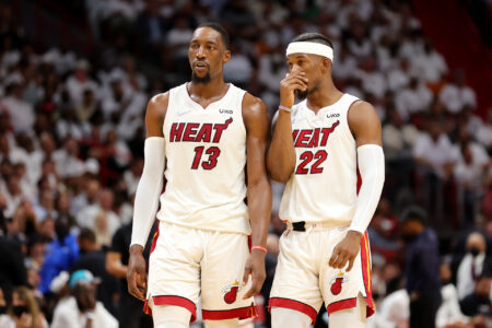 Bam Adebayo #13 and Jimmy Butler #22 of the Miami Heat talk during the second quarter against the Boston Celtics in Game Two of the 2022 NBA Playoffs Eastern Conference Finals at FTX Arena on May 19, 2022 in Miami, Florida.