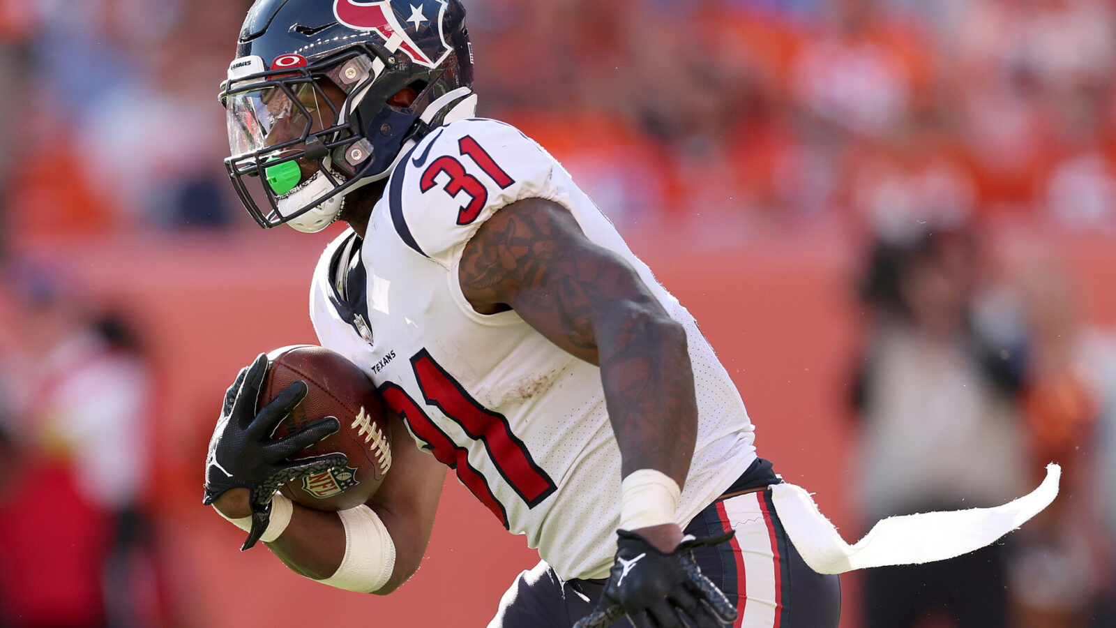 Dameon Pierce #31 of the Houston Texans carries the ball against the Denver Broncos at Empower Field At Mile High on September 18, 2022 in Denver, Colorado.