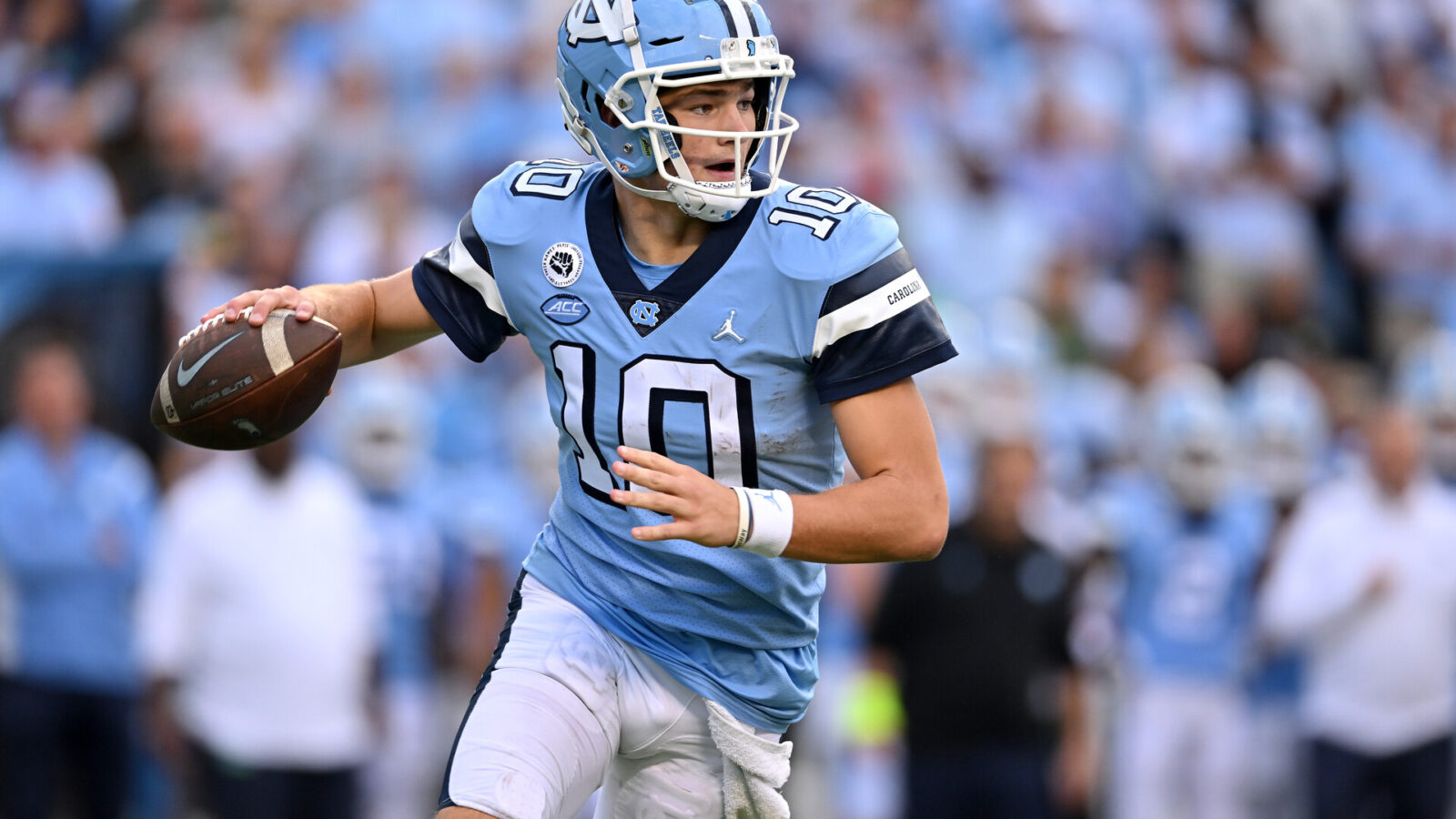 Drake Maye #10 of the North Carolina Tar Heels rolls out against the Notre Dame Fighting Irish during the second half of their game at Kenan Memorial Stadium on September 24, 2022 in Chapel Hill, North Carolina. Notre Dame won 45-32.