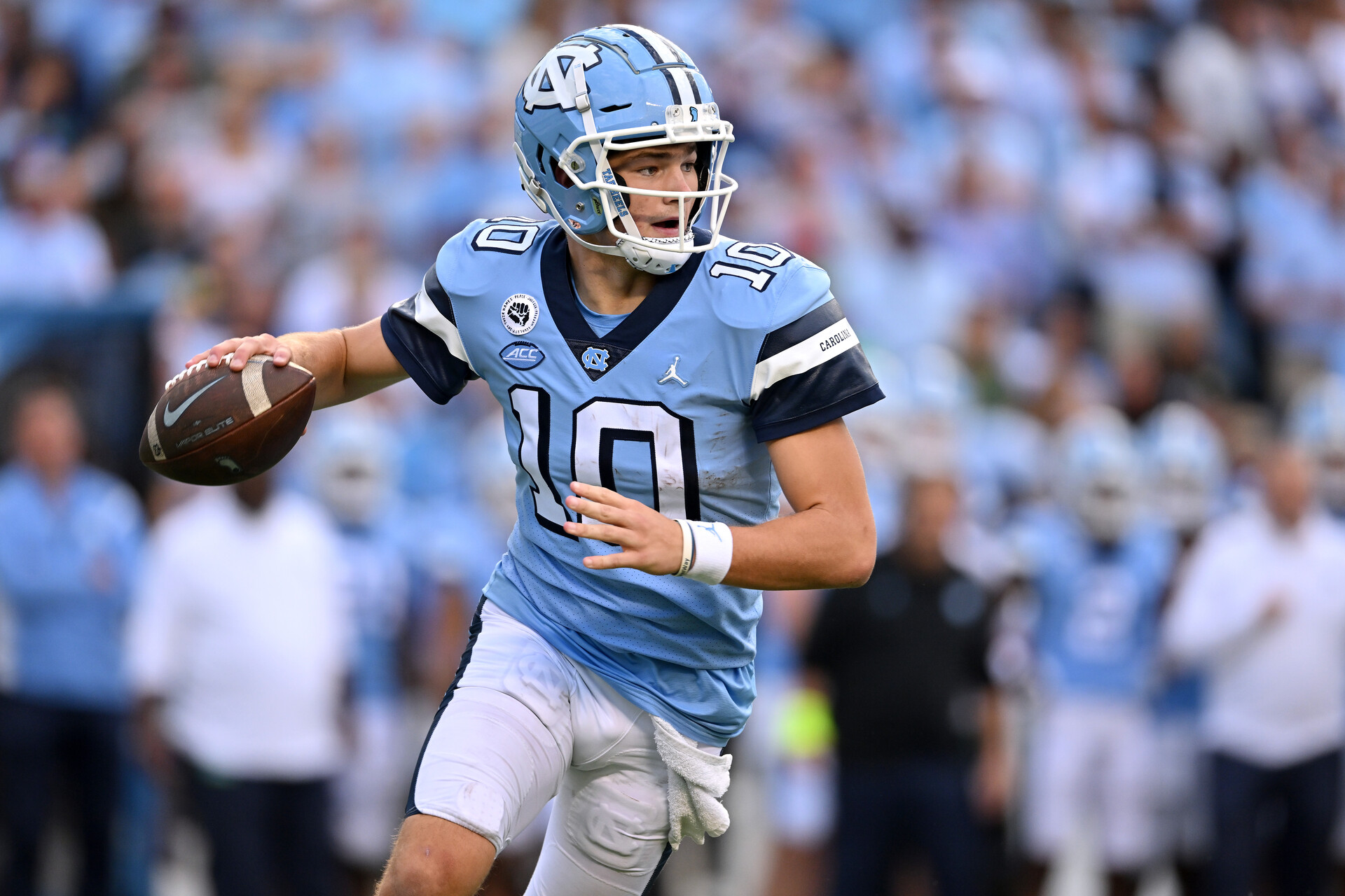 Drake Maye #10 of the North Carolina Tar Heels rolls out against the Notre Dame Fighting Irish during the second half of their game at Kenan Memorial Stadium on September 24, 2022 in Chapel Hill, North Carolina. Notre Dame won 45-32.