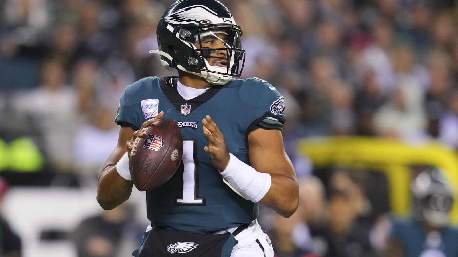 Jalen Hurts #1 of the Philadelphia Eagles looks to pass the ball against the Dallas Cowboys at Lincoln Financial Field on October 16, 2022 in Philadelphia, Pennsylvania.