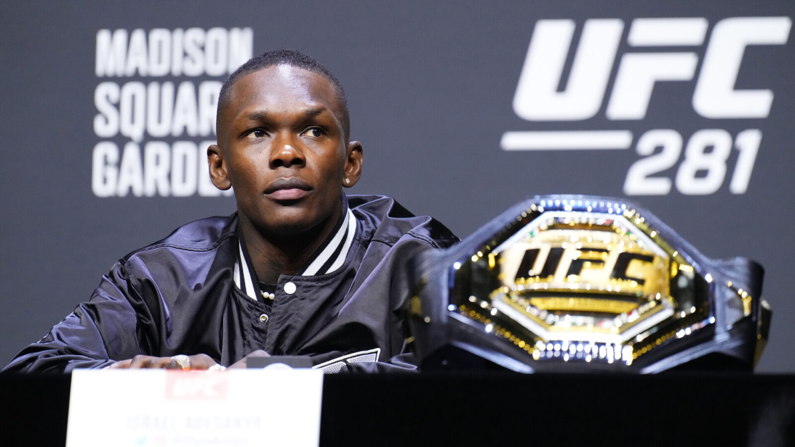 UFC DFS Apps - Israel Adesanya of Nigeria is seen on stage during the UFC 281 press conference at Madison Square Garden on November 09, 2022 in New York City.