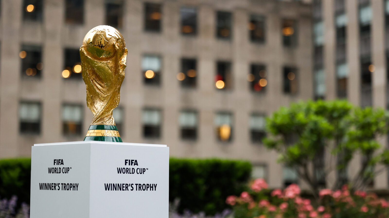 Jun 16, 2022; New York, New York, USA; The FIFA World Cup Trophy sits on a stand outside of 30 Rockefeller Plaza.