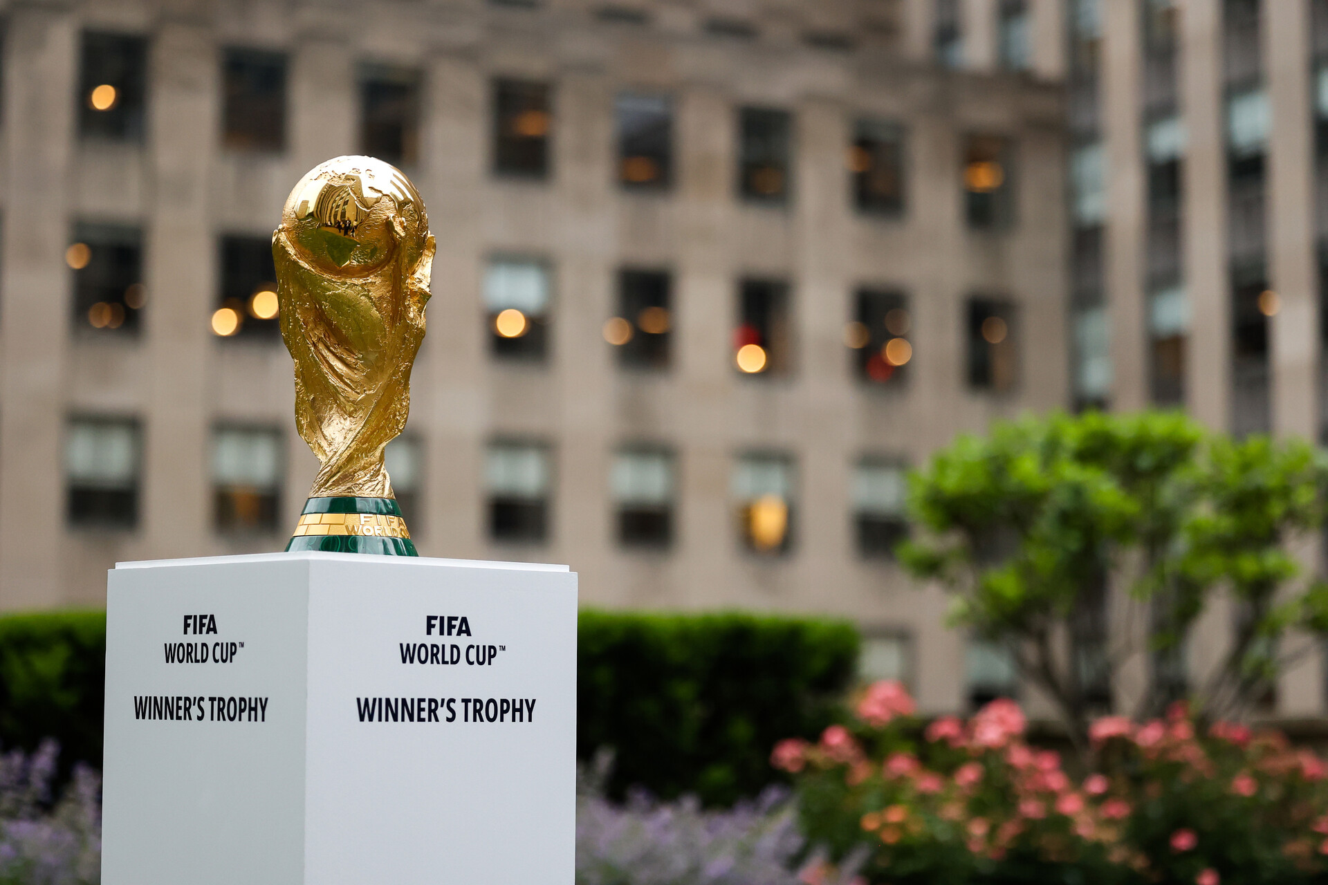 Jun 16, 2022; New York, New York, USA; The FIFA World Cup Trophy sits on a stand outside of 30 Rockefeller Plaza.