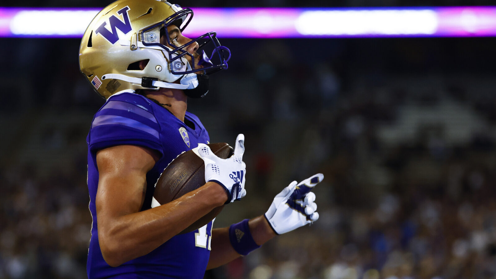 Sep 3, 2022; Seattle, Washington, USA; Washington Huskies wide receiver Jalen McMillan (11) celebrates after catching a touchdown pass against the Kent State Golden Flashes during the third quarter at Alaska Airlines Field at Husky Stadium.