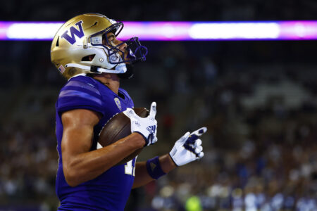 Sep 3, 2022; Seattle, Washington, USA; Washington Huskies wide receiver Jalen McMillan (11) celebrates after catching a touchdown pass against the Kent State Golden Flashes during the third quarter at Alaska Airlines Field at Husky Stadium.