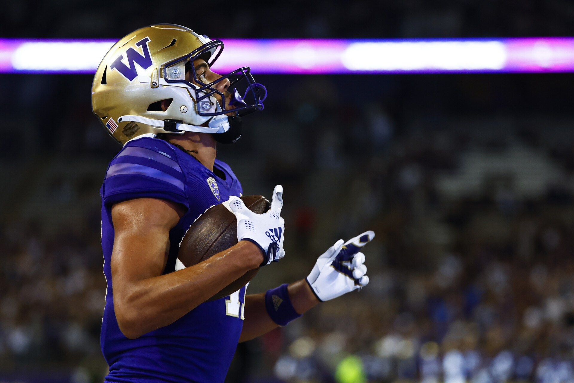 Sep 3, 2022; Seattle, Washington, USA; Washington Huskies wide receiver Jalen McMillan (11) celebrates after catching a touchdown pass against the Kent State Golden Flashes during the third quarter at Alaska Airlines Field at Husky Stadium.