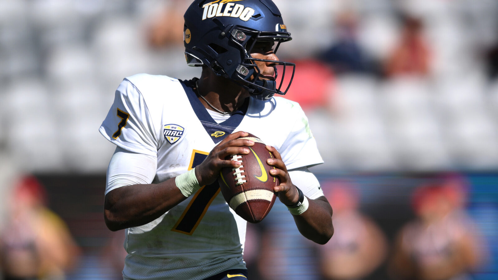 Toledo Rockets quarterback Dequan Finn (7) looks to pass against the San Diego State Aztecs during the second half at Snapdragon Stadium.