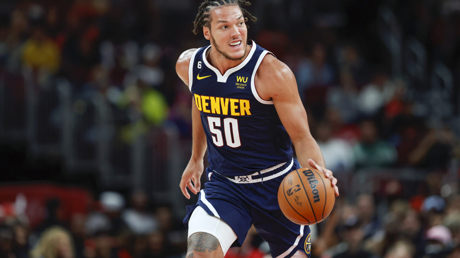 Oct 7, 2022; Chicago, Illinois, USA; Denver Nuggets forward Aaron Gordon (50) brings the ball up court against the Chicago Bulls during the second half at United Center.