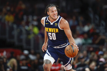 Oct 7, 2022; Chicago, Illinois, USA; Denver Nuggets forward Aaron Gordon (50) brings the ball up court against the Chicago Bulls during the second half at United Center.
