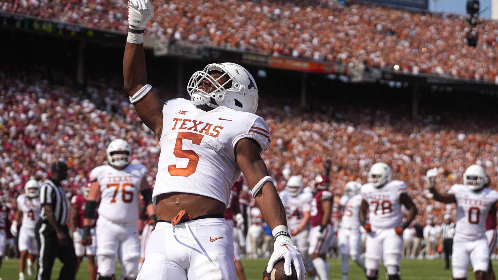 Oct 8, 2022; Dallas, Texas, USA: Texas Longhorns running back Bijan Robinson (5) celebrates after scoring a touchdown inst the Oklahoma Soonduring the annual Red River Showdown agaers at the Cotton Bowl.
