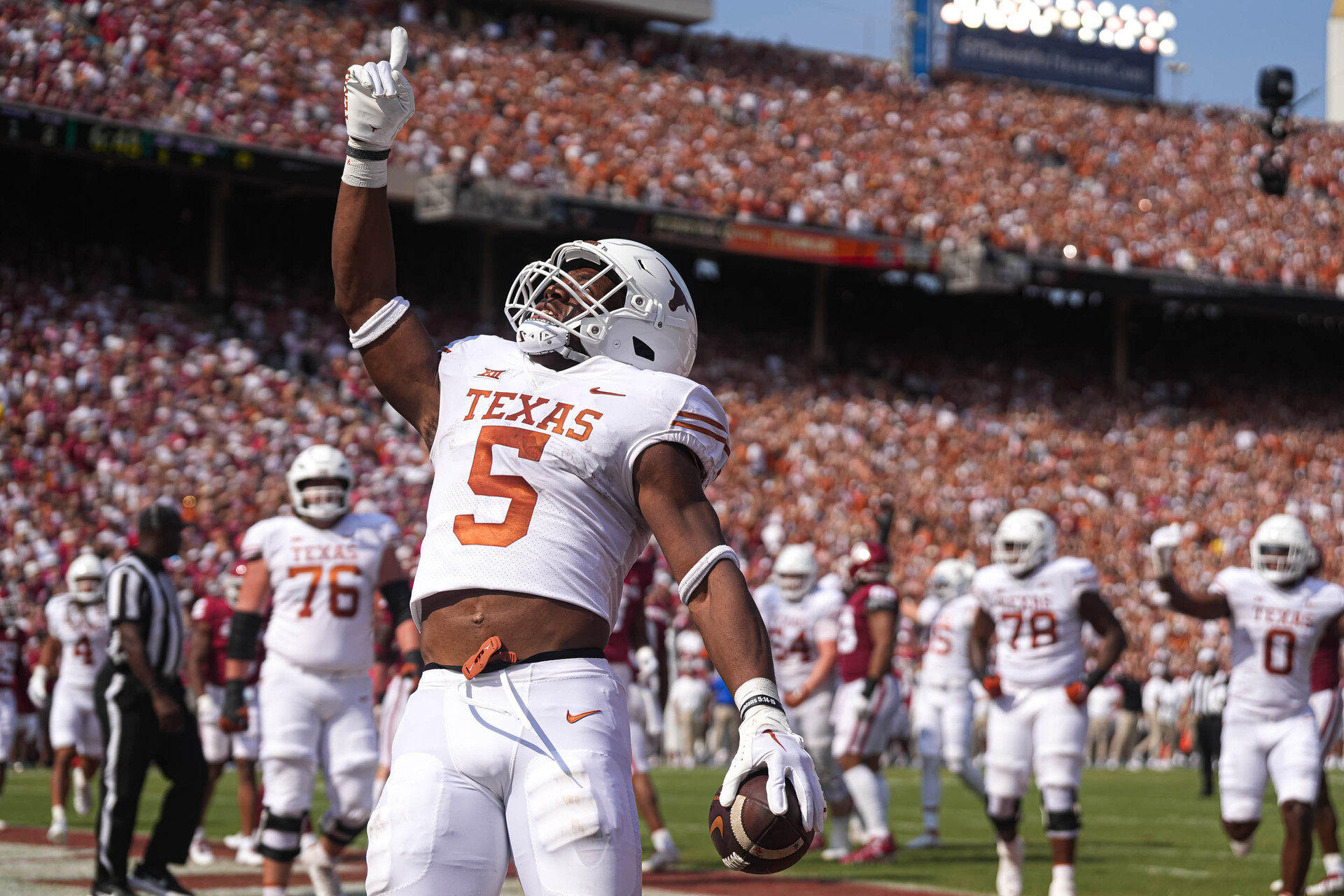 Oct 8, 2022; Dallas, Texas, USA: Texas Longhorns running back Bijan Robinson (5) celebrates after scoring a touchdown inst the Oklahoma Soonduring the annual Red River Showdown agaers at the Cotton Bowl.
