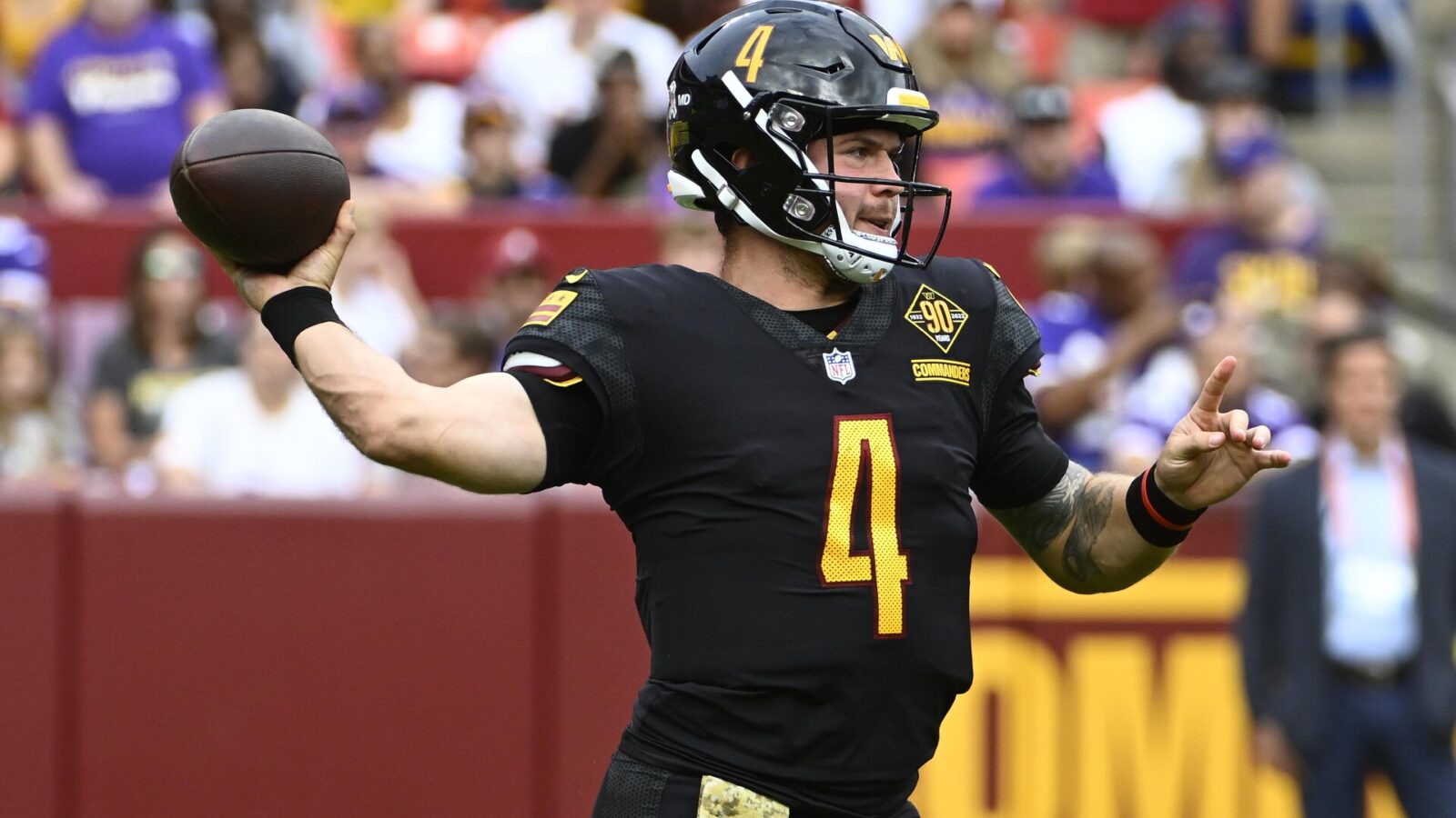 Nov 6, 2022; Landover, Maryland, USA; Washington Commanders quarterback Taylor Heinicke (4) attempts a pass against the Minnesota Vikings during the first half at FedExField.