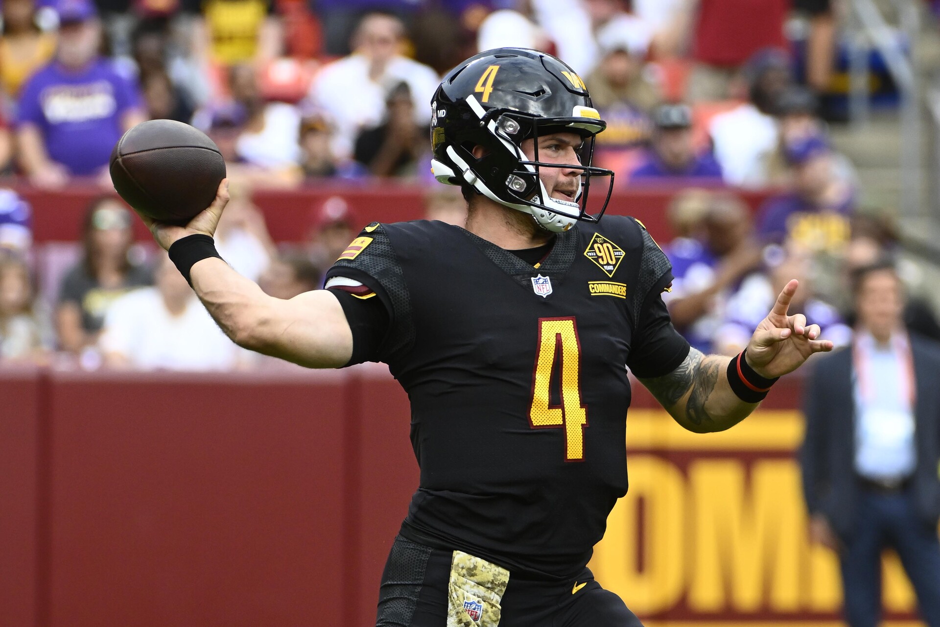 Nov 6, 2022; Landover, Maryland, USA; Washington Commanders quarterback Taylor Heinicke (4) attempts a pass against the Minnesota Vikings during the first half at FedExField.