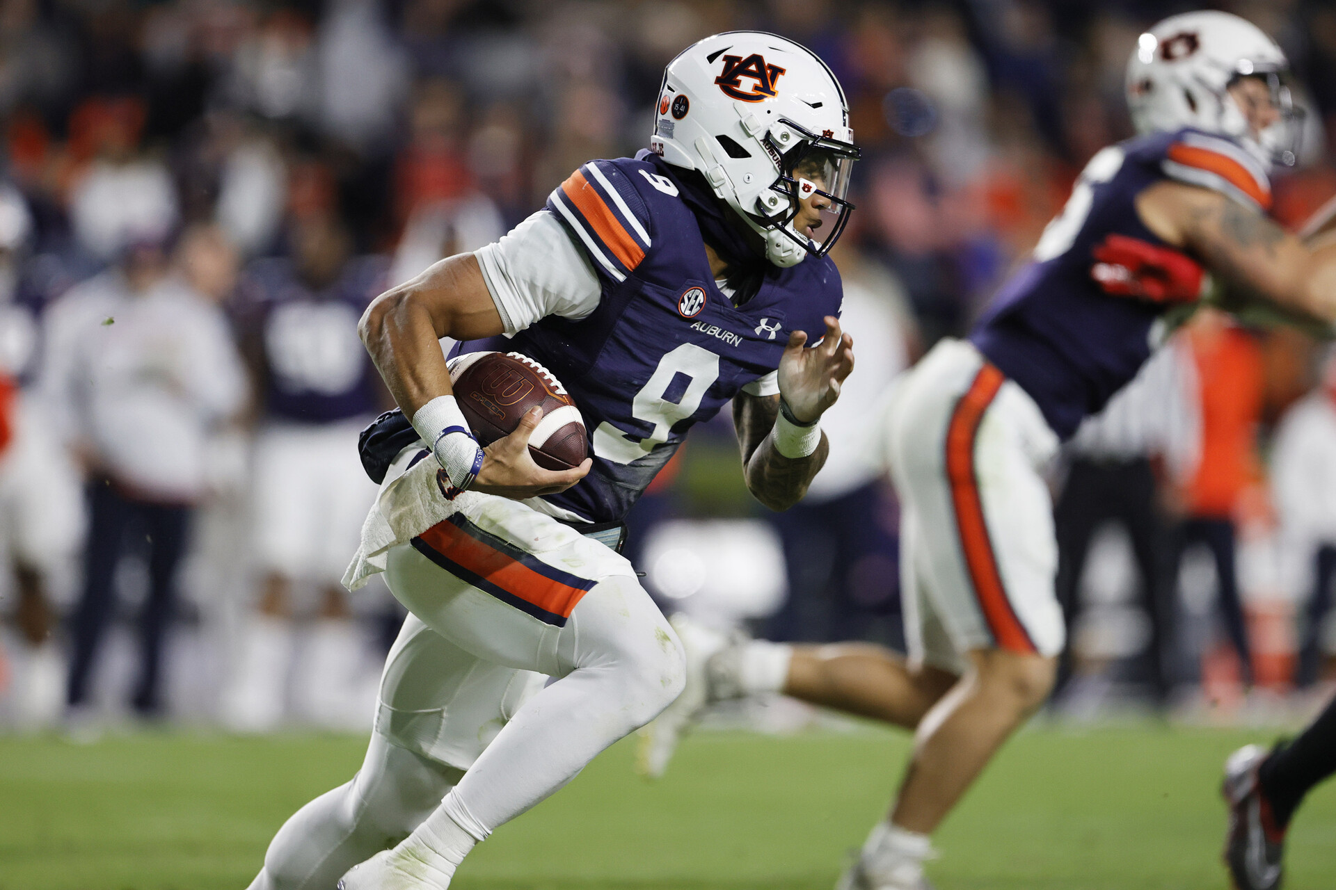 Nov 19, 2022; Auburn, Alabama, USA; Auburn Tigers quarterback Robby Ashford (9) scrambles for yardage during the third quarter against the Western Kentucky Hilltoppers at Jordan-Hare Stadium.