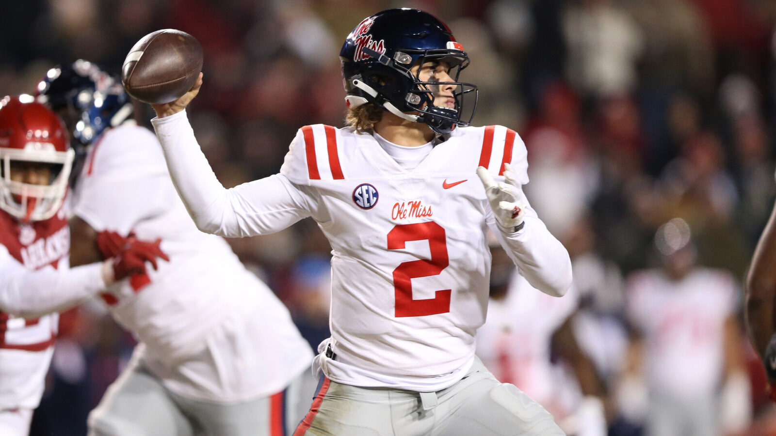 Nov 19, 2022; Fayetteville, Arkansas, USA; Ole Miss Rebels quarterback Jaxson Dart (2) passes in the second quarter against the Arkansas Razorbacks at Donald W. Reynolds Razorback Stadium.