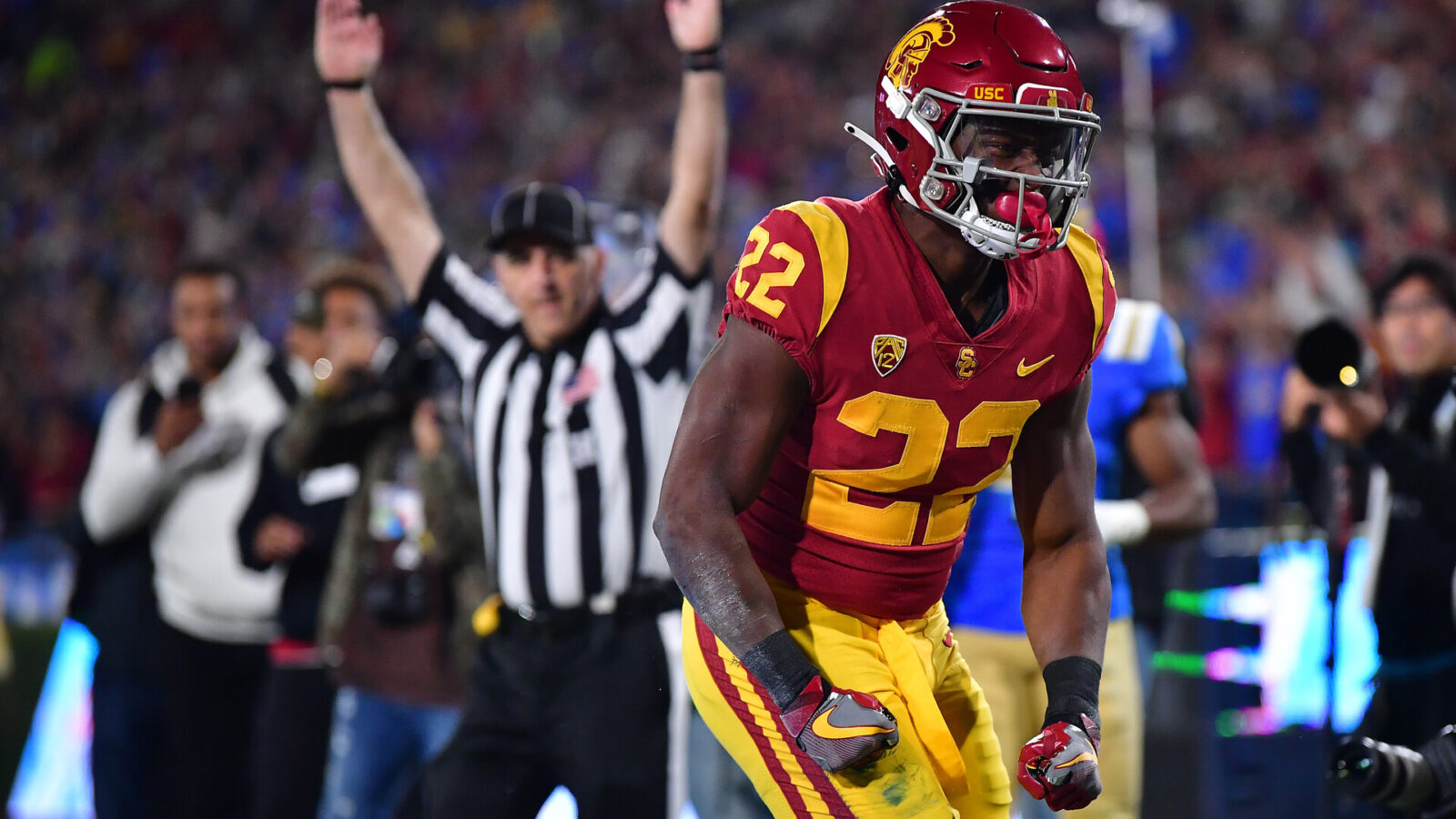 Nov 19, 2022; Pasadena, California, USA; Southern California Trojans running back Darwin Barlow (22) celebrates his touchdown scored against the UCLA Bruins during the second half at the Rose Bowl.