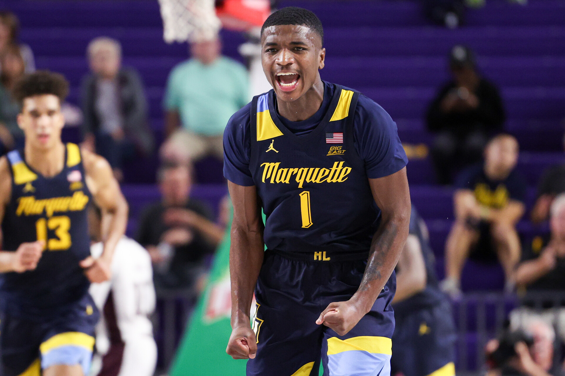 Marquette Golden Eagles guard Kam Jones (1) reacts after a basket against the Mississippi State Bulldogs in the second half during the Fort Myers Tip-off at Suncoast Credit Union Arena.