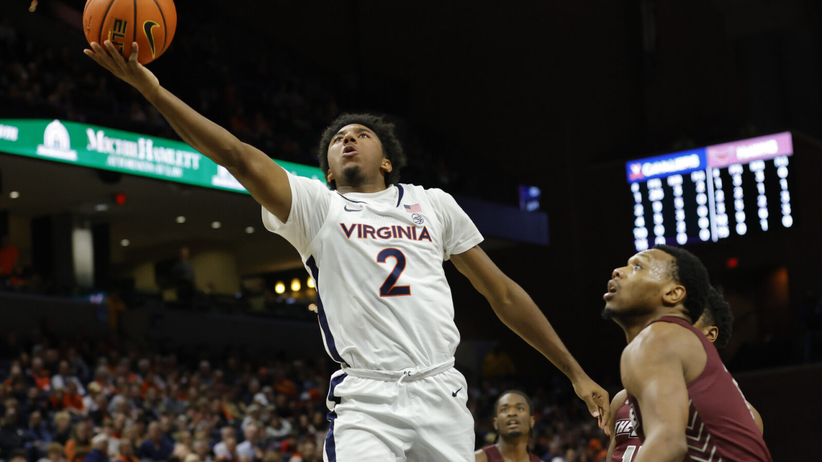 Virginia Cavaliers guard Reece Beekman (2) shoots the ball as Maryland-Eastern Shore Hawks guard Da'Shawn Phillip (5) looks on in the second half at John Paul Jones Arena.