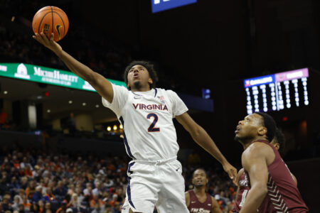 Virginia Cavaliers guard Reece Beekman (2) shoots the ball as Maryland-Eastern Shore Hawks guard Da'Shawn Phillip (5) looks on in the second half at John Paul Jones Arena.
