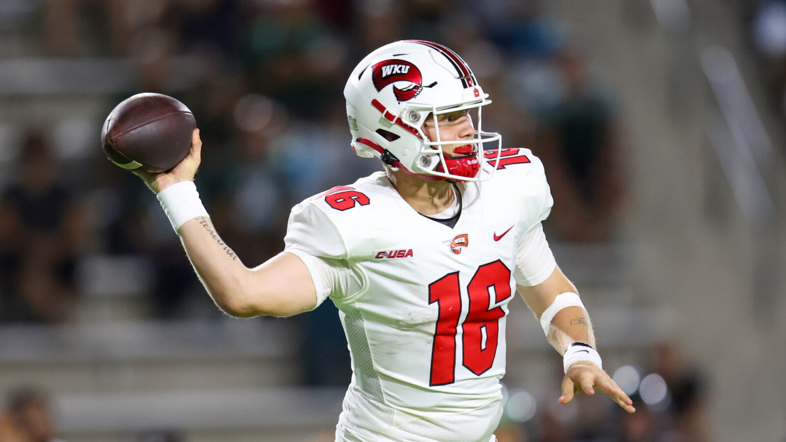 Austin Reed #16 of the Western Kentucky Hilltoppers fires a pass downfield during the second half of an NCAA football game against the Hawaii Rainbow Warriors at the Clarance T.C. Ching Athletic Complex on September 3, 2022 in Honolulu, Hawaii.