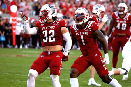 Drake Thomas #32 of the North Carolina State Wolfpack reacts following a defensive play against the Boston College Eagles during the first half of the game at Carter-Finley Stadium on November 12, 2022 in Raleigh, North Carolina.