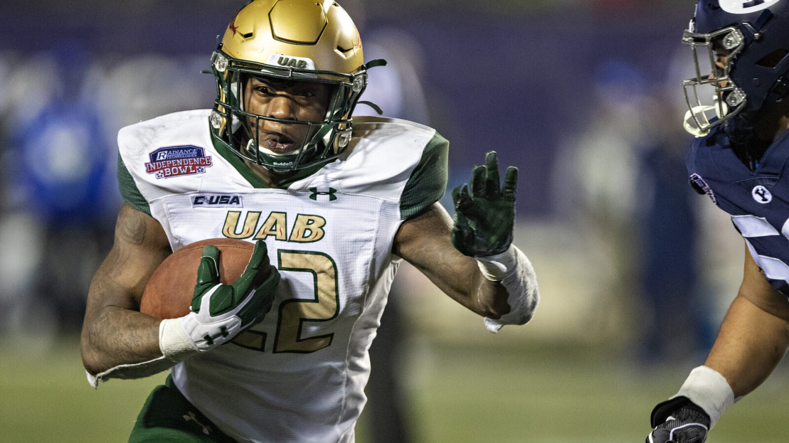DeWayne McBride #22 of the UAB Blazers runs the ball for a touchdown during a game against the BYU Cougars during the Radiance Technologies Independence Bowl at Independence Stadium on December 18, 2021 in Shreveport, Louisiana. The Blazers defeated the Cougars 31-28.