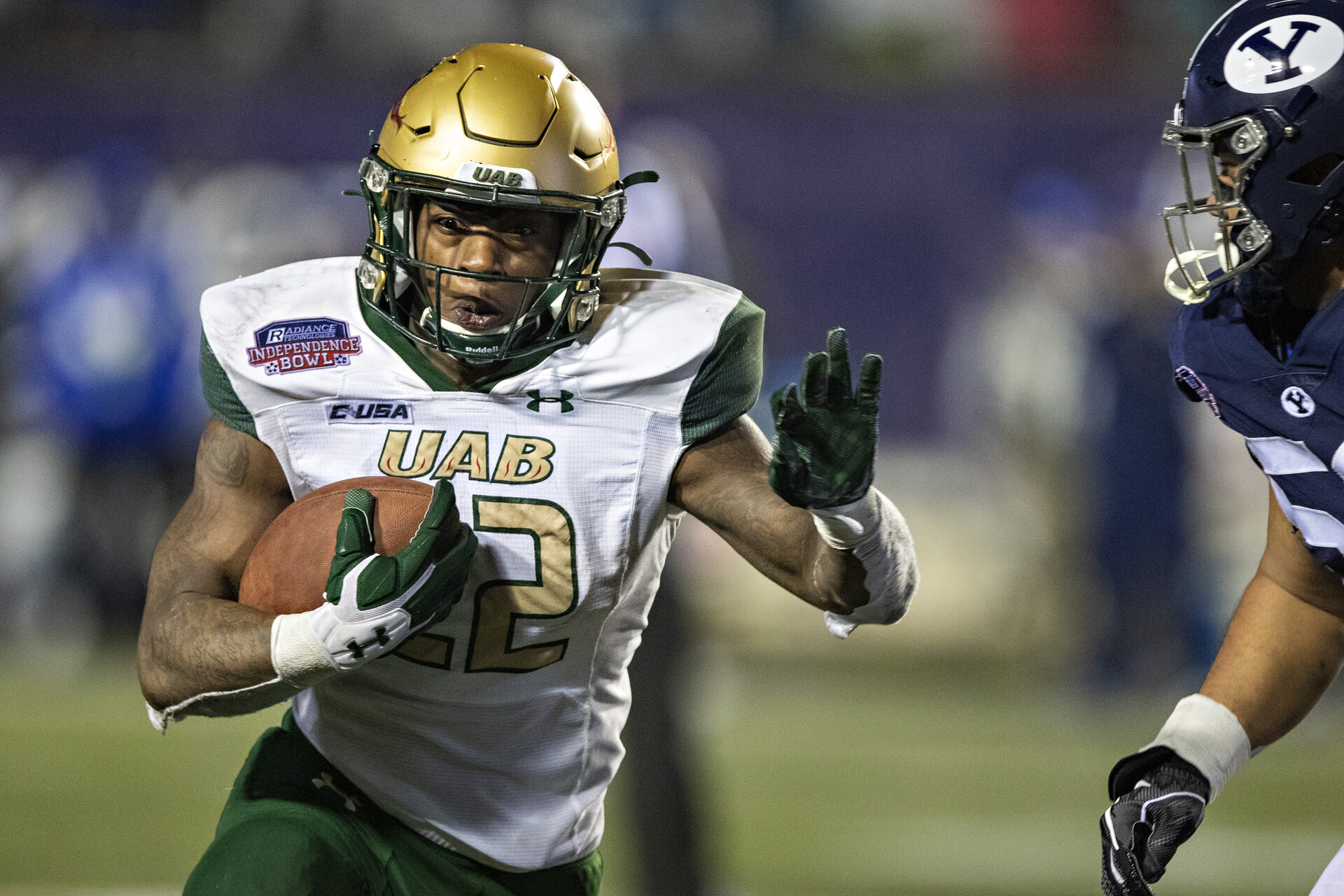 DeWayne McBride #22 of the UAB Blazers runs the ball for a touchdown during a game against the BYU Cougars during the Radiance Technologies Independence Bowl at Independence Stadium on December 18, 2021 in Shreveport, Louisiana. The Blazers defeated the Cougars 31-28.
