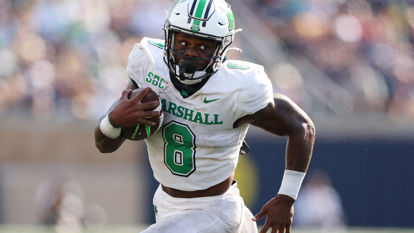 Khalan Laborn #8 of the Marshall Thundering Herd runs with the ball against the Notre Dame Fighting Irish during the second half at Notre Dame Stadium on September 10, 2022 in South Bend, Indiana.