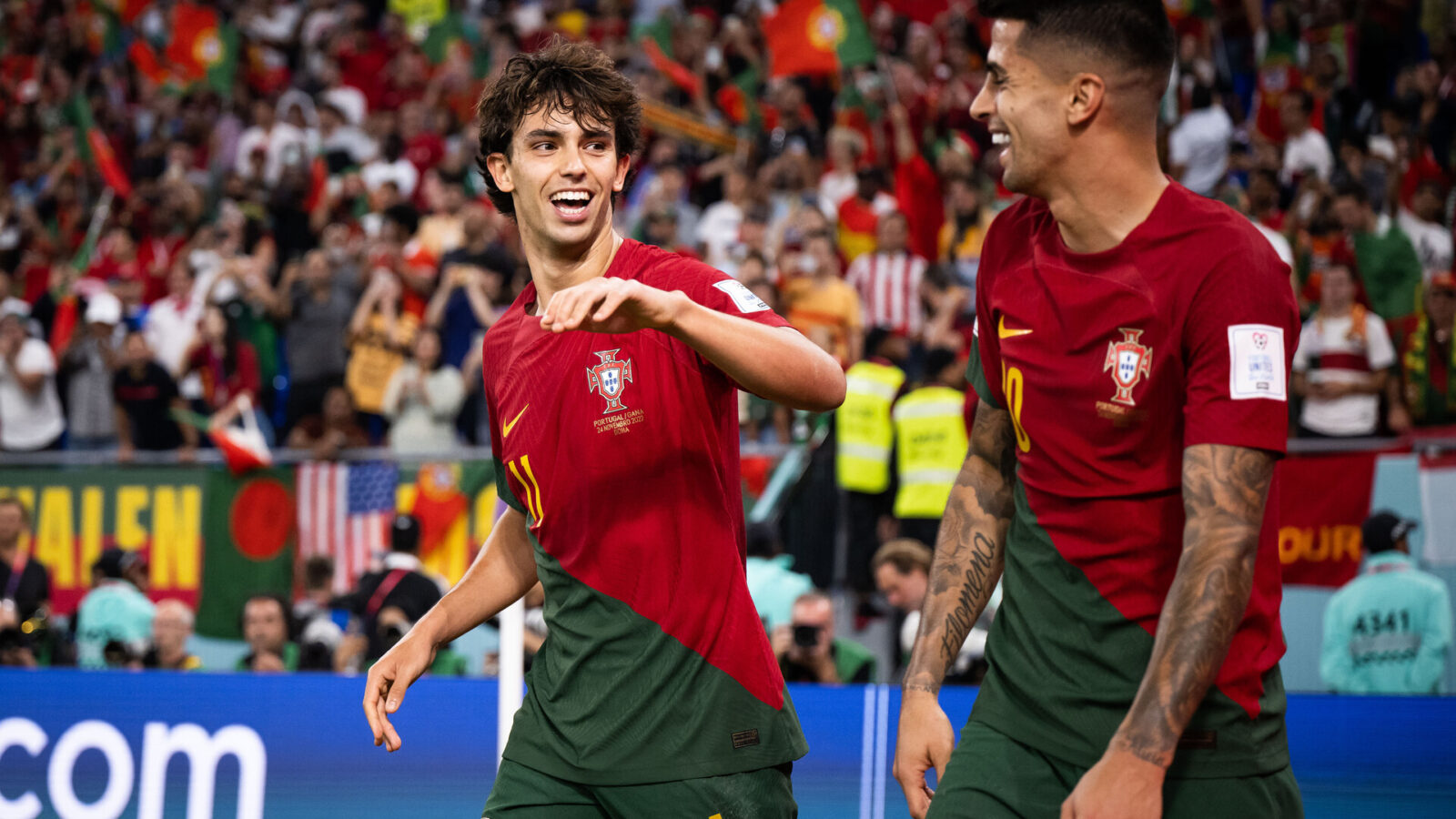 Joao Felix (L) of Portugal celebrates with Joao Cancelo (R) of Portugal after scoring his team's second goal during the FIFA World Cup Qatar 2022 Group H match between Portugal and Ghana at Stadium 974 on November 24, 2022 in Doha, Qatar.