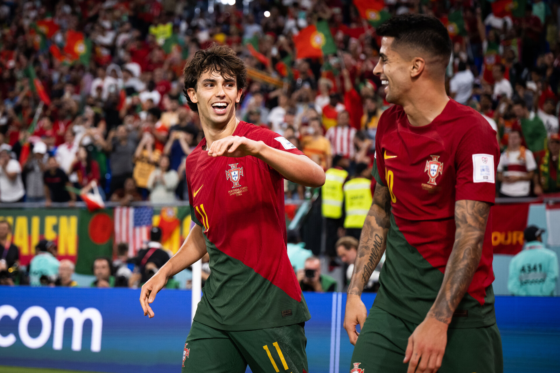 Joao Felix (L) of Portugal celebrates with Joao Cancelo (R) of Portugal after scoring his team's second goal during the FIFA World Cup Qatar 2022 Group H match between Portugal and Ghana at Stadium 974 on November 24, 2022 in Doha, Qatar.