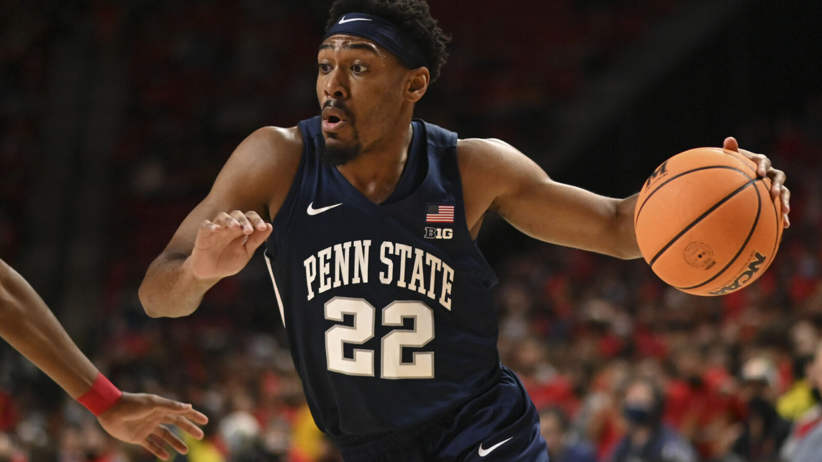 College Park, Maryland, USA; Penn State Nittany Lions guard Jalen Pickett (22) dribbles rot the basket during the first half against the Maryland Terrapins at Xfinity Center.