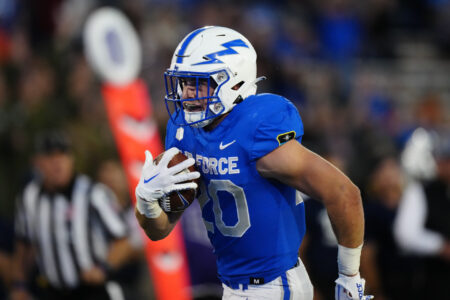 Air Force Falcons running back Brad Roberts (20) carries the ball in the second quarter against the Nevada Wolf Pack at Falcon Stadium.