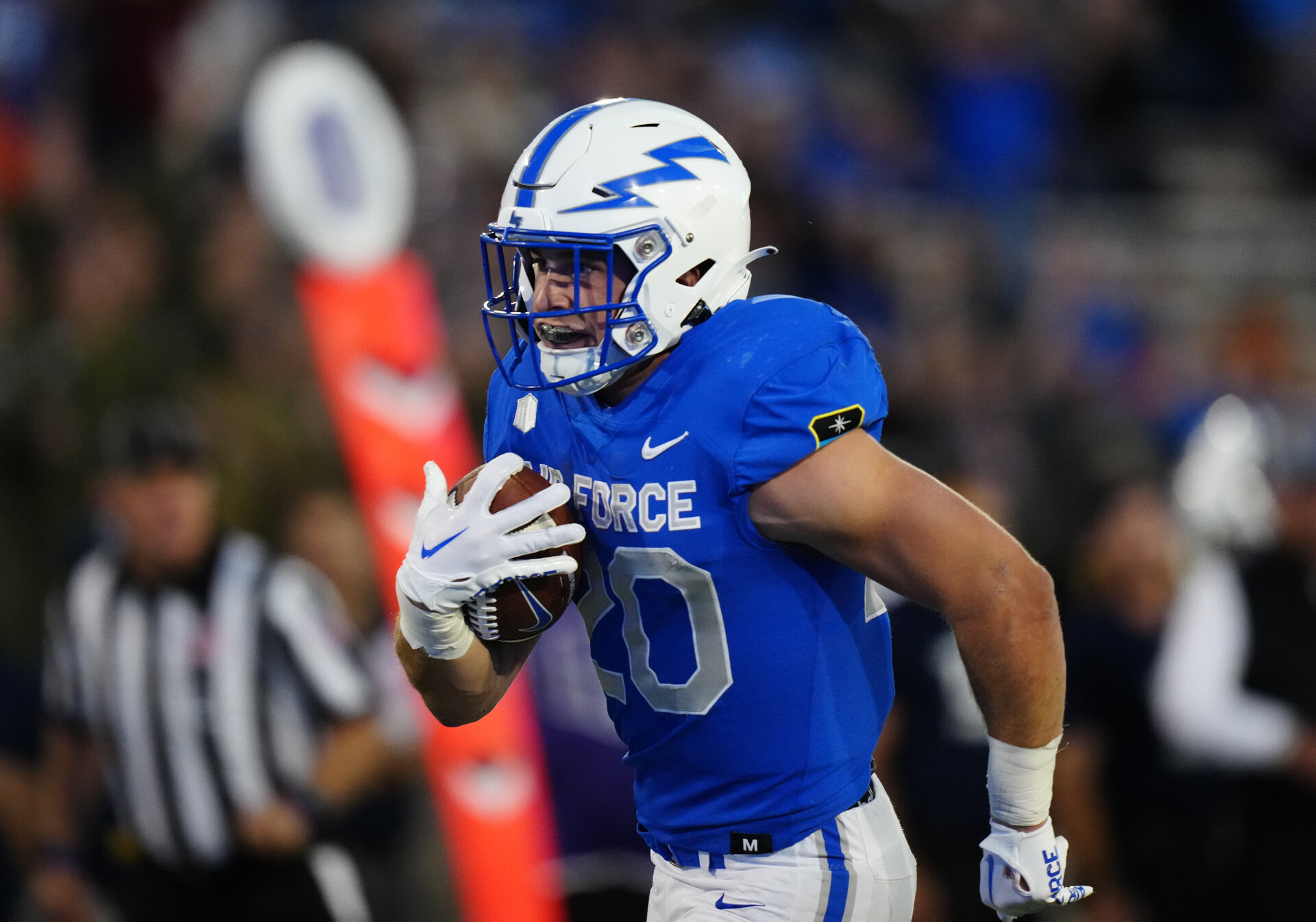 Air Force Falcons running back Brad Roberts (20) carries the ball in the second quarter against the Nevada Wolf Pack at Falcon Stadium.