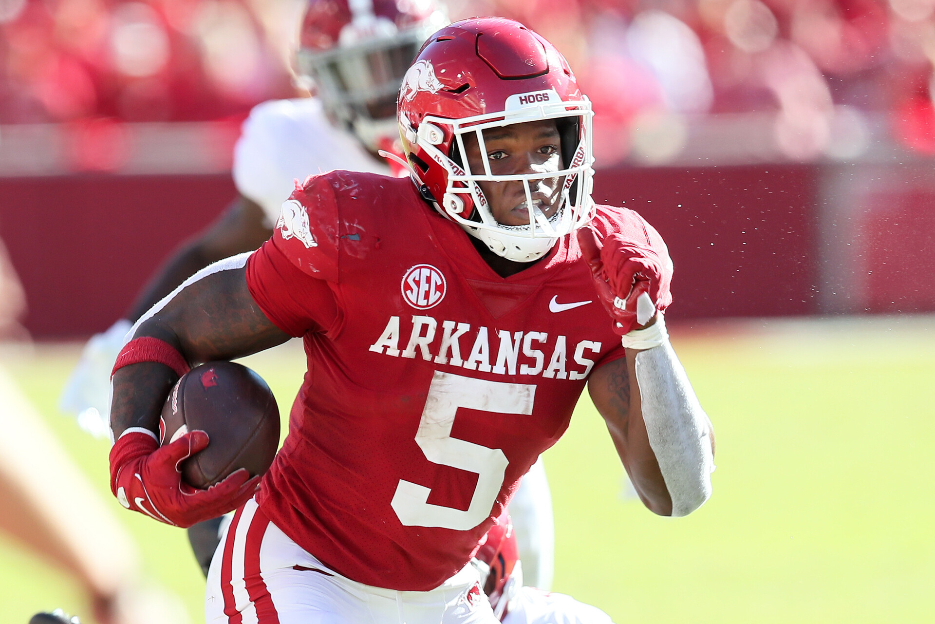 Arkansas Razorbacks running back Raheim Sanders (5) rushes in the second quarter against the Alabama Crimson Tide at Donald W. Reynolds Razorback Stadium.